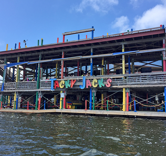 Exterior shot of Tacky Jacks from the water
